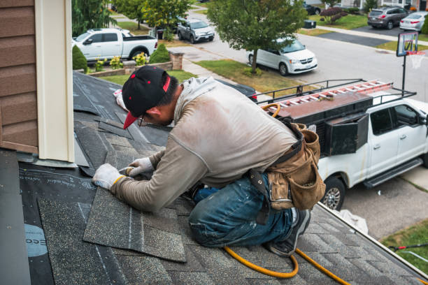 Professional Emergency Roof Repair technician working in Maine, NY